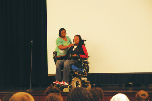 Paralyzed football player Eric LeGrand inspires Fisher Middle School students