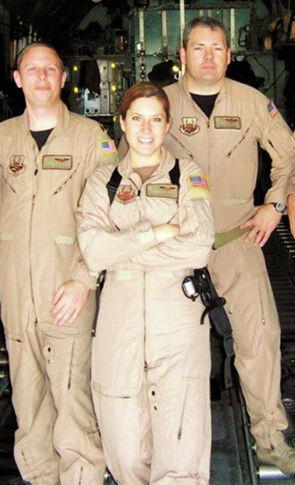 Helping hand: Air Force takes Ewing’s Jamie Mucciarelli around the world