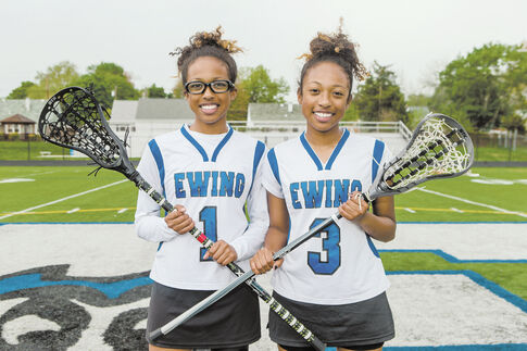Sister act excels for Ewing lax