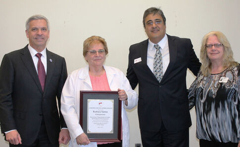 Service award presented to Dept of Labor and Workforce Development