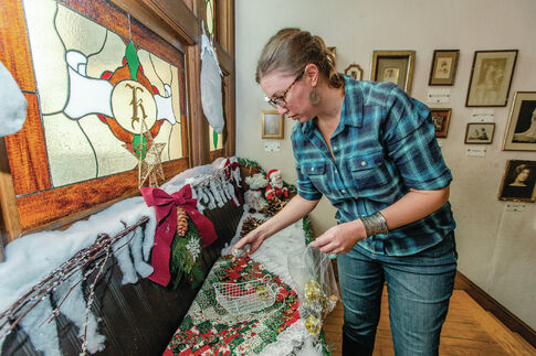 Tour guides take care to preserve holiday spirit at Kuser Mansion