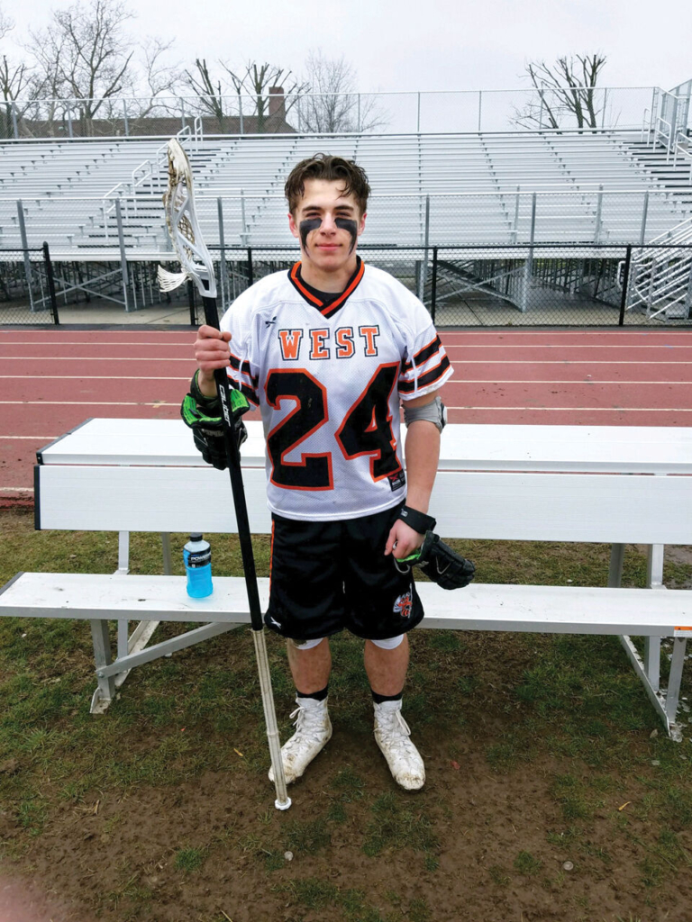 Dalton Adams leads Hamilton High West lacrosse from pole position