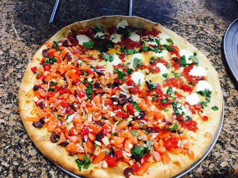Communities say thanks with kindness — and pizza